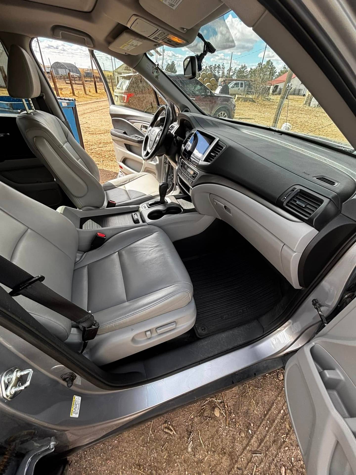 Dirty front passenger area before detailing