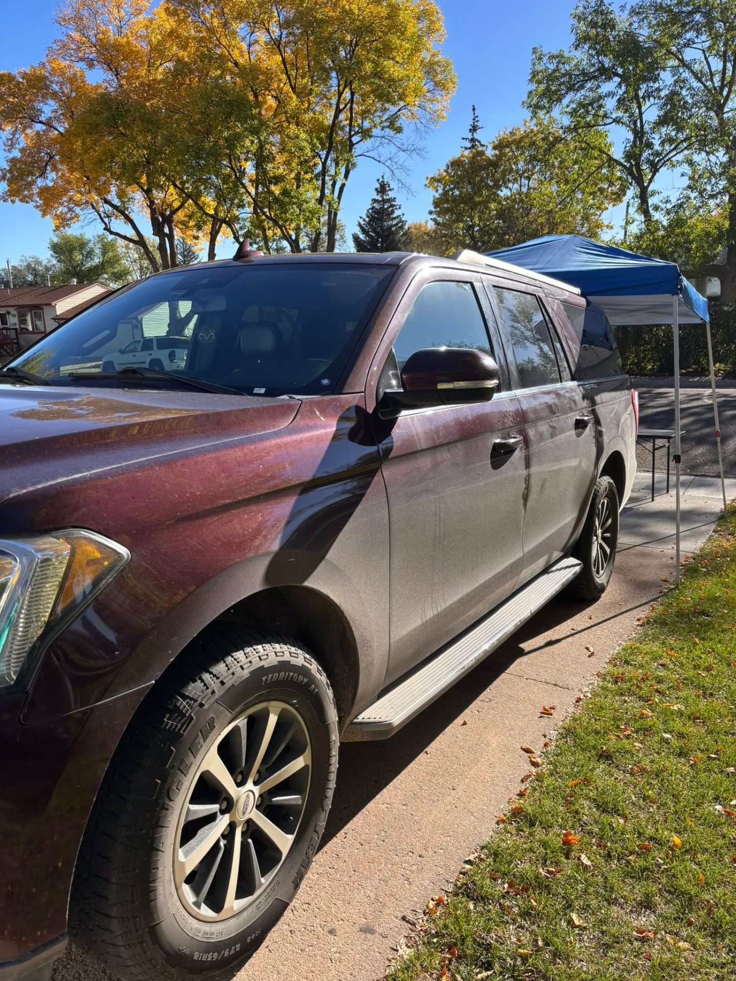 Glossy SUV exterior after detailing